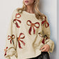 Double Take Christmas Bow Sequin Round Neck Dropped Shoulder Sweatshirt